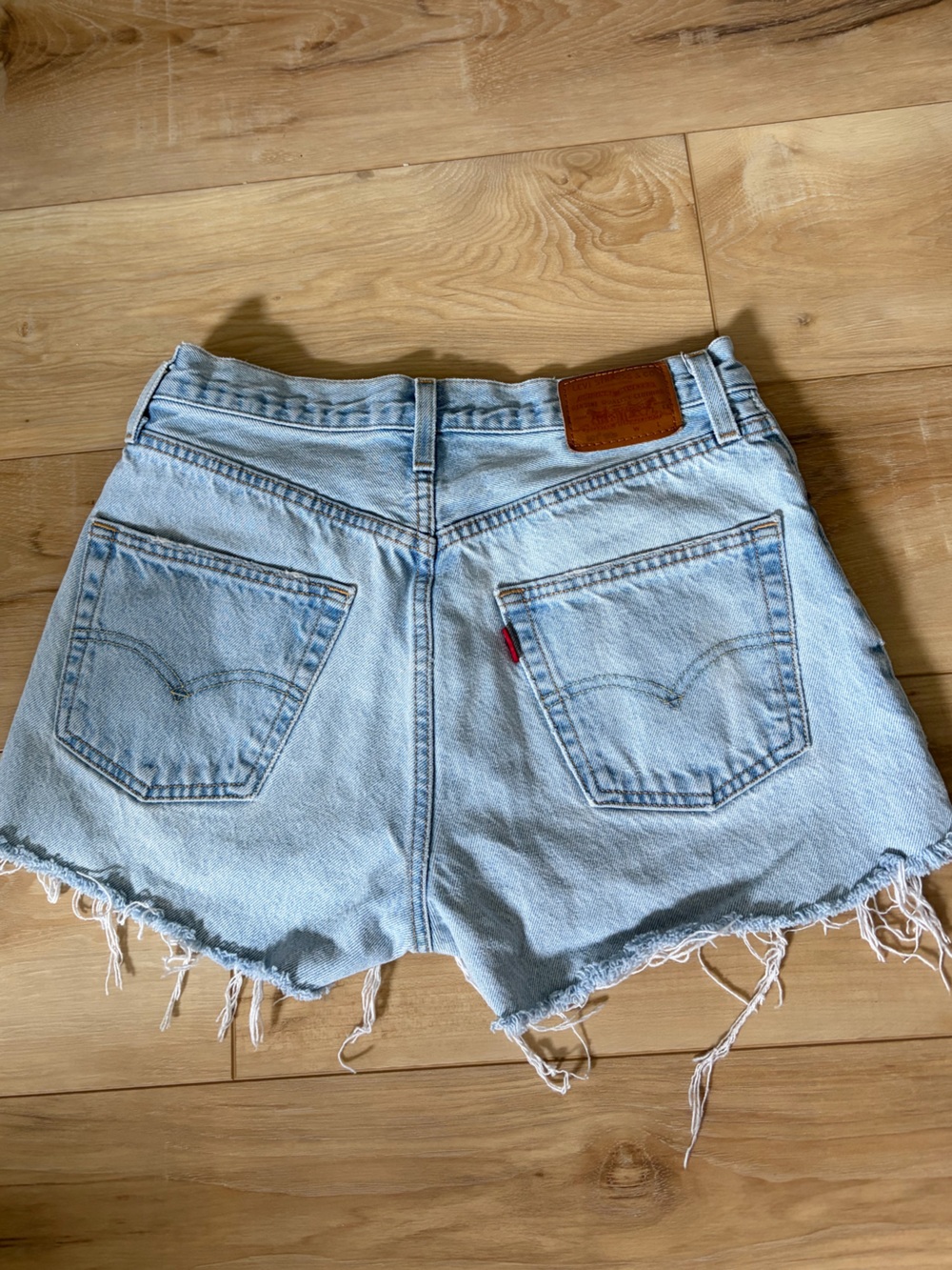 Levi's Light Blue Frayed Denim Cutoff Shorts